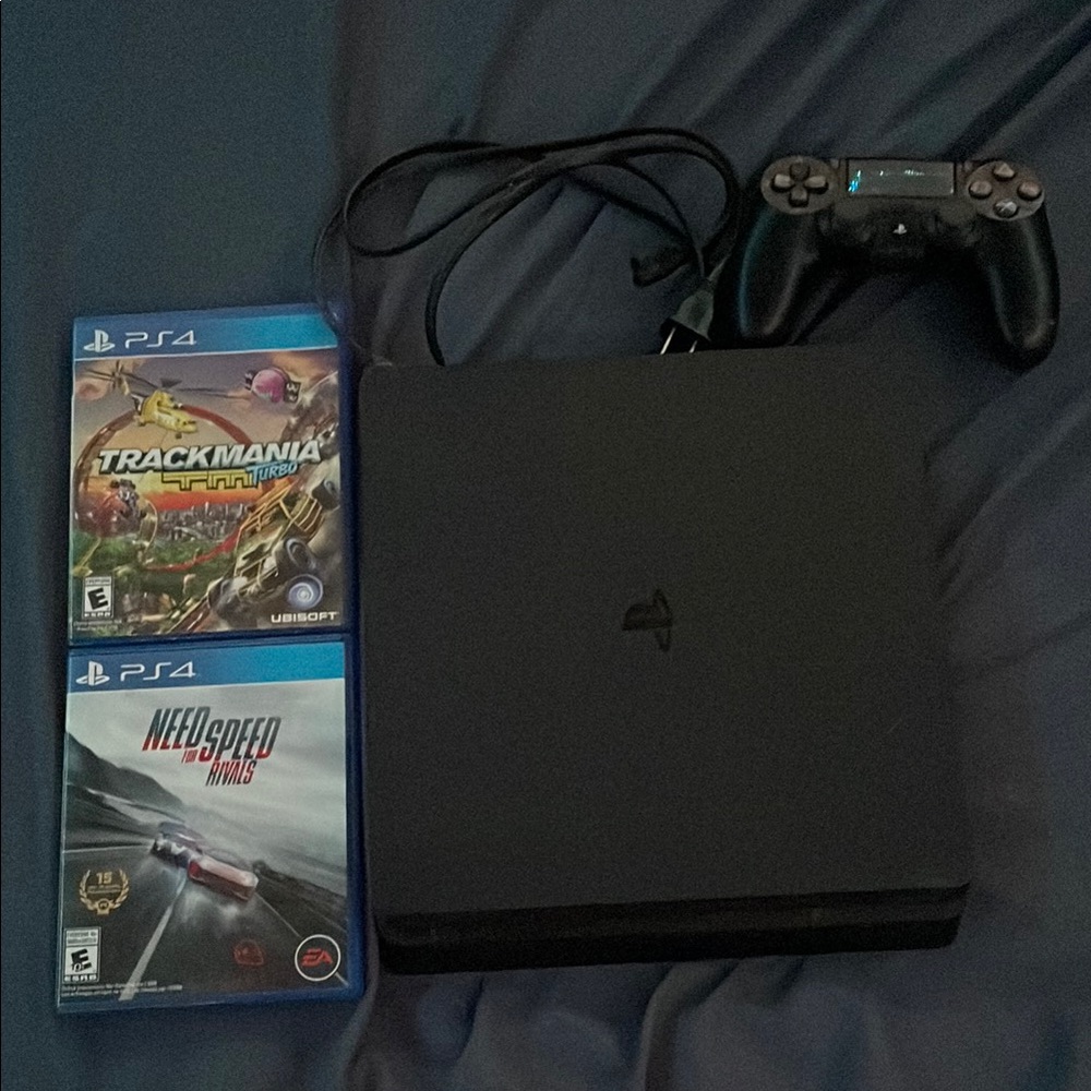 Sony PlayStation 4 Console with Controller and Games